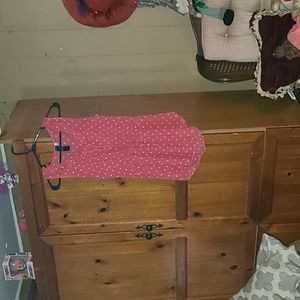 Red and white polka dot blouse.